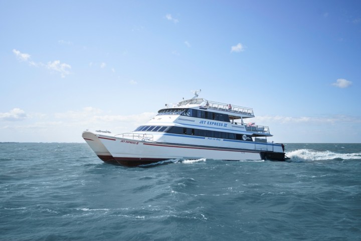 a small boat in a large body of water