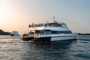 a boat is docked next to a body of water