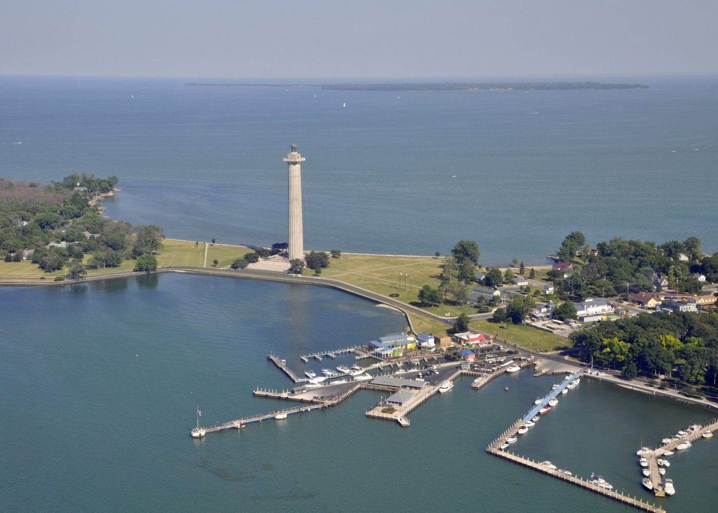 a body of water with a city in the background