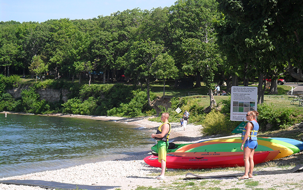 people kayaking and swimming at south bass island state park