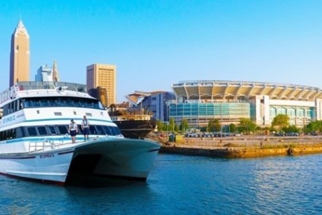 a boat is docked next to a body of water